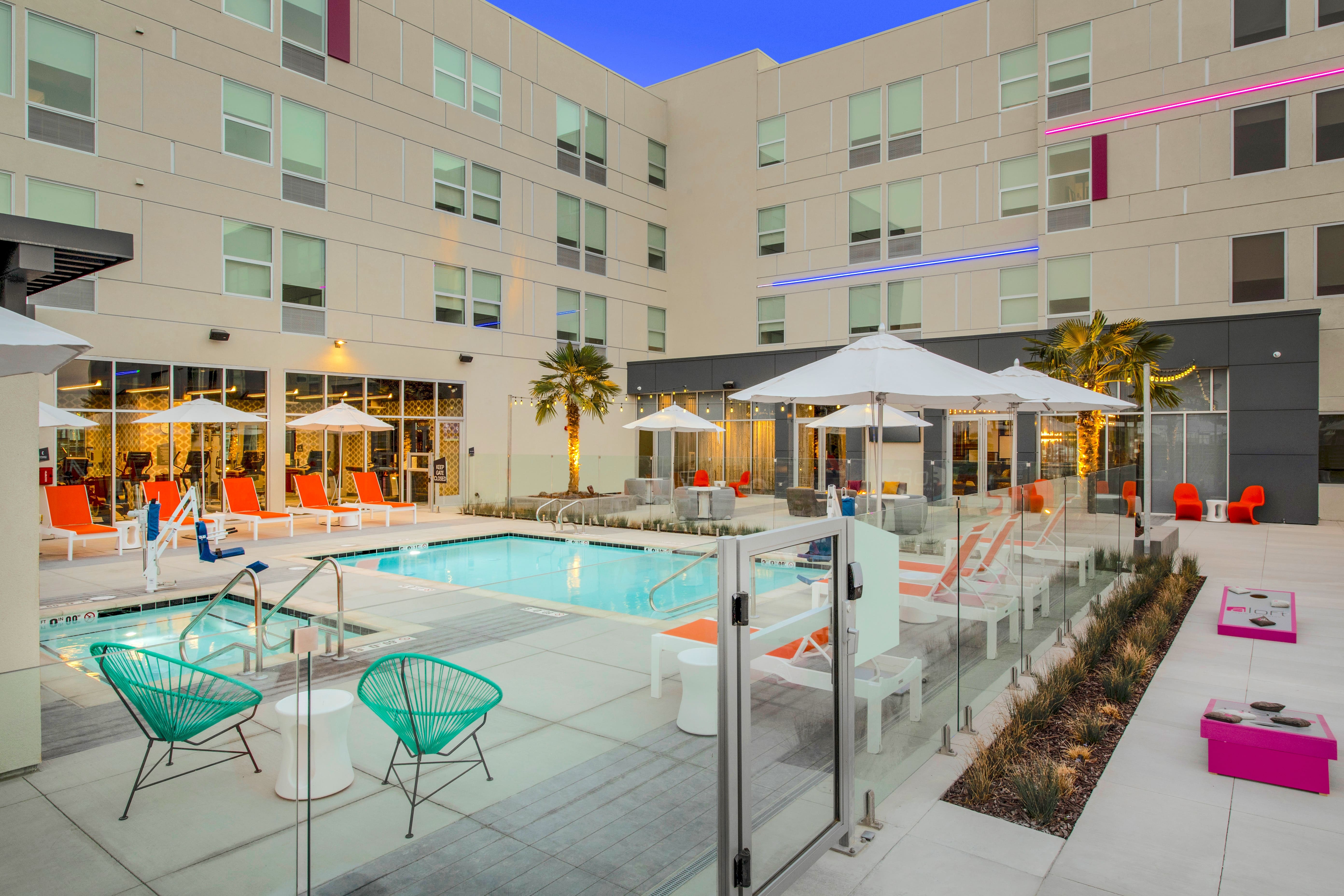 Commercial glass pool fence at a hotel property